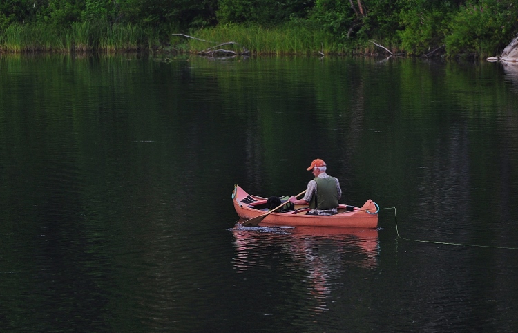fishing boat on lake